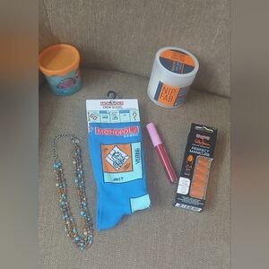 6: socks, lip plumper,nails, necklace, facial pads,slime